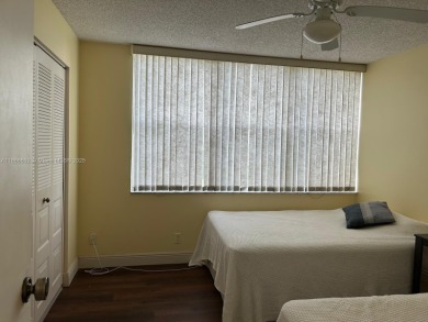 BEAUTIFUL 2/2 CONDO - ENCLOSED AND SCREENED BALCONY WITH VIEW ON on  in Florida - for sale on GolfHomes.com, golf home, golf lot