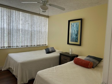 BEAUTIFUL 2/2 CONDO - ENCLOSED AND SCREENED BALCONY WITH VIEW ON on  in Florida - for sale on GolfHomes.com, golf home, golf lot