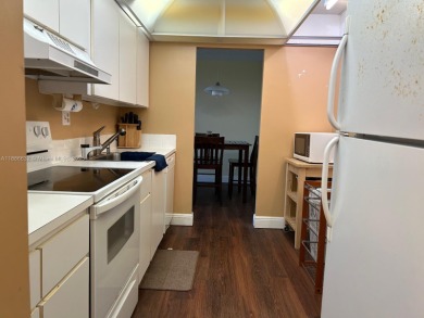 BEAUTIFUL 2/2 CONDO - ENCLOSED AND SCREENED BALCONY WITH VIEW ON on  in Florida - for sale on GolfHomes.com, golf home, golf lot