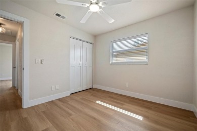 *Modern Coastal Stunner* - The minute you walk in the door, it's on St. Petersburg Country Club in Florida - for sale on GolfHomes.com, golf home, golf lot
