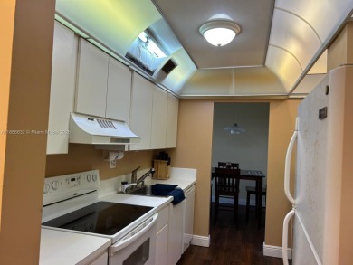 BEAUTIFUL 2/2 CONDO - ENCLOSED AND SCREENED BALCONY WITH VIEW ON on  in Florida - for sale on GolfHomes.com, golf home, golf lot