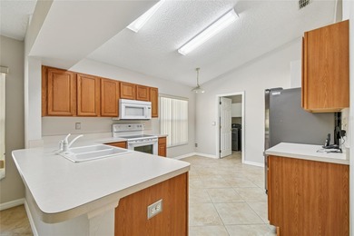 Under contract-accepting backup offers. Welcome to your dream on Kings Ridge Golf Club in Florida - for sale on GolfHomes.com, golf home, golf lot