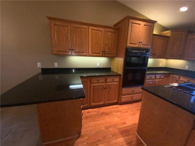 Welcome to this stunning, move-in-ready home located on the 14th on River Oaks Golf Club in Minnesota - for sale on GolfHomes.com, golf home, golf lot