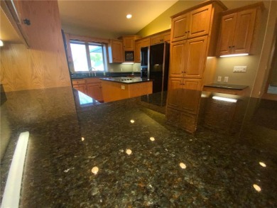 Welcome to this stunning, move-in-ready home located on the 14th on River Oaks Golf Club in Minnesota - for sale on GolfHomes.com, golf home, golf lot
