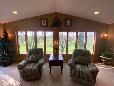 Welcome to this stunning, move-in-ready home located on the 14th on River Oaks Golf Club in Minnesota - for sale on GolfHomes.com, golf home, golf lot