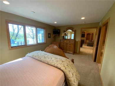 Welcome to this stunning, move-in-ready home located on the 14th on River Oaks Golf Club in Minnesota - for sale on GolfHomes.com, golf home, golf lot
