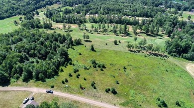 Build your getaway on this level open lot overlooking the 9th on Sunset View Golf and Estates in Wisconsin - for sale on GolfHomes.com, golf home, golf lot