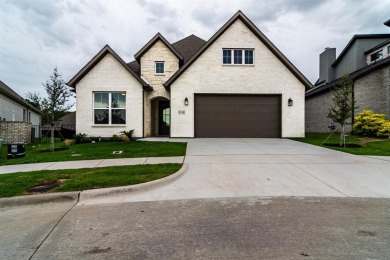 BUILDER OFFERING A 2-1 INTEREST RATE BUYDOWN. Welcome to the on Heath Golf and Yacht Club in Texas - for sale on GolfHomes.com, golf home, golf lot