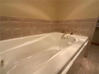 Welcome to this stunning, move-in-ready home located on the 14th on River Oaks Golf Club in Minnesota - for sale on GolfHomes.com, golf home, golf lot
