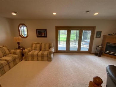 Welcome to this stunning, move-in-ready home located on the 14th on River Oaks Golf Club in Minnesota - for sale on GolfHomes.com, golf home, golf lot