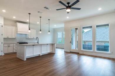 BUILDER OFFERING A 2-1 INTEREST RATE BUYDOWN. Welcome to the on Heath Golf and Yacht Club in Texas - for sale on GolfHomes.com, golf home, golf lot