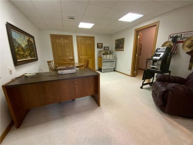 Welcome to this stunning, move-in-ready home located on the 14th on River Oaks Golf Club in Minnesota - for sale on GolfHomes.com, golf home, golf lot