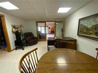 Welcome to this stunning, move-in-ready home located on the 14th on River Oaks Golf Club in Minnesota - for sale on GolfHomes.com, golf home, golf lot