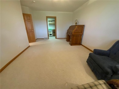 Welcome to this stunning, move-in-ready home located on the 14th on River Oaks Golf Club in Minnesota - for sale on GolfHomes.com, golf home, golf lot