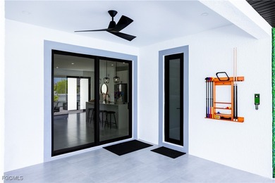 Welcome to this modern 2023 built home located in the desirable on Burnt Store Golf Club in Florida - for sale on GolfHomes.com, golf home, golf lot