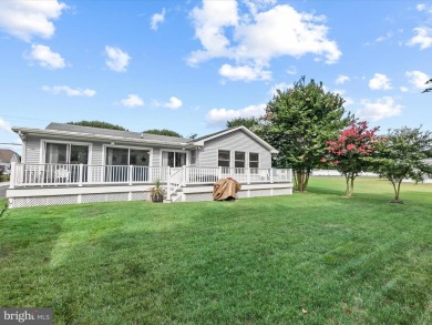 Discover the charm of this delightful 3-bedroom, 2-bath home in on Bayside Resort Golf Club in Delaware - for sale on GolfHomes.com, golf home, golf lot