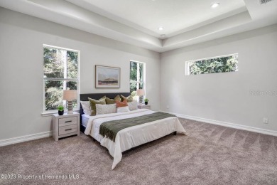 A $20,000 promotion towards closing costs or upgrades is offered on Southern Hills Plantation Club in Florida - for sale on GolfHomes.com, golf home, golf lot