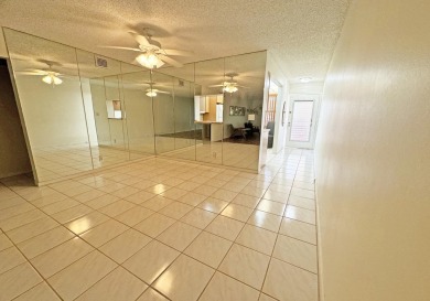**DRASTIC REDUCTION** GATED, GOLF COMMUNITY WITH THEATER on Wynmoor Golf Course in Florida - for sale on GolfHomes.com, golf home, golf lot
