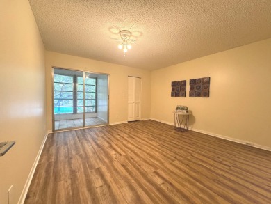 **DRASTIC REDUCTION** GATED, GOLF COMMUNITY WITH THEATER on Wynmoor Golf Course in Florida - for sale on GolfHomes.com, golf home, golf lot