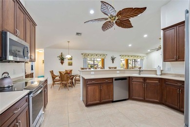 Immaculate & pristine home seated on a private, canal-front lot on Rotonda Golf and Country Club - Long Marsh  in Florida - for sale on GolfHomes.com, golf home, golf lot