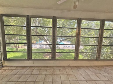 **DRASTIC REDUCTION** GATED, GOLF COMMUNITY WITH THEATER on Wynmoor Golf Course in Florida - for sale on GolfHomes.com, golf home, golf lot
