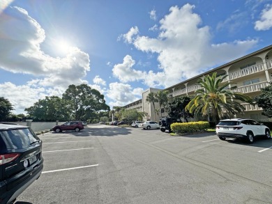 **DRASTIC REDUCTION** GATED, GOLF COMMUNITY WITH THEATER on Wynmoor Golf Course in Florida - for sale on GolfHomes.com, golf home, golf lot