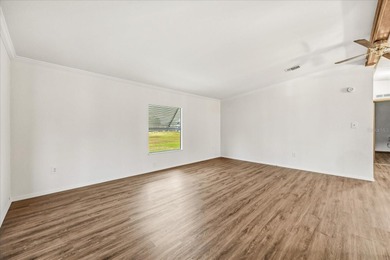 Stunning, completely remodeled 2-bedroom, 2-bathroom home with on Zellwood Station Country Club in Florida - for sale on GolfHomes.com, golf home, golf lot