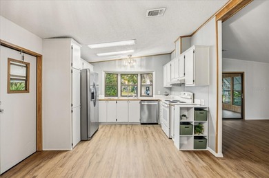 Stunning, completely remodeled 2-bedroom, 2-bathroom home with on Zellwood Station Country Club in Florida - for sale on GolfHomes.com, golf home, golf lot