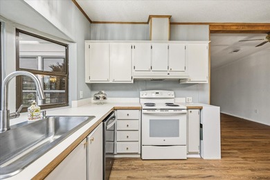 Stunning, completely remodeled 2-bedroom, 2-bathroom home with on Zellwood Station Country Club in Florida - for sale on GolfHomes.com, golf home, golf lot