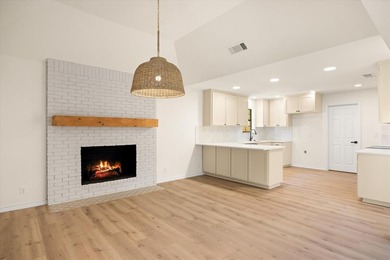 Welcome to this beautifully renovated home nestled in the heart on Pecan Plantation Country Club in Texas - for sale on GolfHomes.com, golf home, golf lot