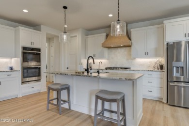 Welcome to this beautiful 4/3/2 home, built in 2022 by Flatland on Red Feather Golf and Social Club in Texas - for sale on GolfHomes.com, golf home, golf lot