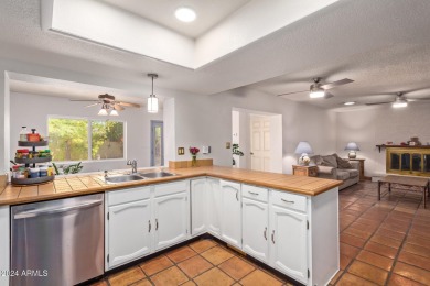 5 BR 2.5 BA single level home in prestigious Laguna Shores of on Dobson Ranch Municipal Golf Course in Arizona - for sale on GolfHomes.com, golf home, golf lot