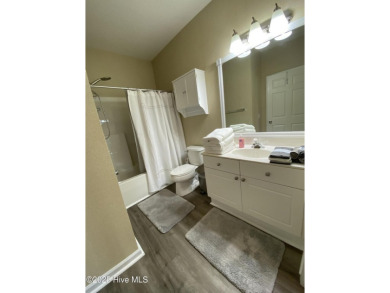 Must see! Fully furnished condo located in the Resort style on Magnolia Greens Golf Plantation in North Carolina - for sale on GolfHomes.com, golf home, golf lot