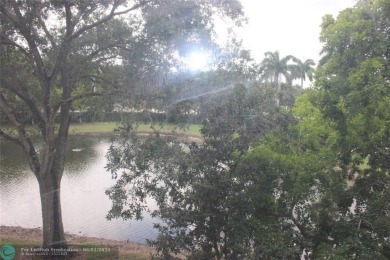 ESTATE SALE, MOTIVATED SELLER. GREAT OPPORTUNITY TO OWN A 2/2 on Wynmoor Golf Course in Florida - for sale on GolfHomes.com, golf home, golf lot