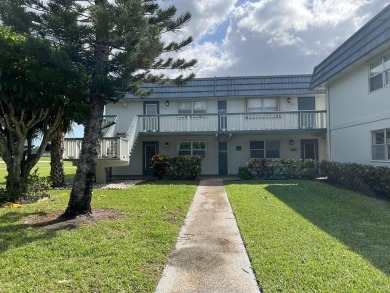 Light and bright second floor end-unit in Tuscany at Kings Point on Kings Point Golf - Executive in Florida - for sale on GolfHomes.com, golf home, golf lot