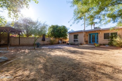 5 BR 2.5 BA single level home in prestigious Laguna Shores of on Dobson Ranch Municipal Golf Course in Arizona - for sale on GolfHomes.com, golf home, golf lot