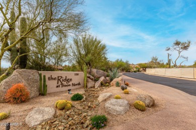 Now offered at an incredible new price, this stunning retreat in on Troon North Golf Club  in Arizona - for sale on GolfHomes.com, golf home, golf lot