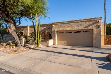 5 BR 2.5 BA single level home in prestigious Laguna Shores of on Dobson Ranch Municipal Golf Course in Arizona - for sale on GolfHomes.com, golf home, golf lot