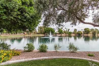 5 BR 2.5 BA single level home in prestigious Laguna Shores of on Dobson Ranch Municipal Golf Course in Arizona - for sale on GolfHomes.com, golf home, golf lot