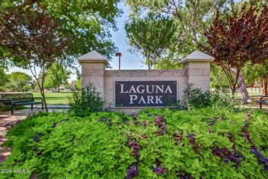 5 BR 2.5 BA single level home in prestigious Laguna Shores of on Dobson Ranch Municipal Golf Course in Arizona - for sale on GolfHomes.com, golf home, golf lot