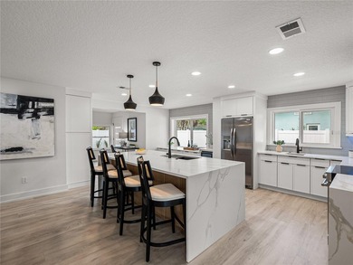 Like new coastal modern living in one of St. Petersburg's most on Pasadena Yacht and Country Club in Florida - for sale on GolfHomes.com, golf home, golf lot