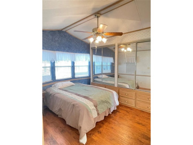 RETIRE WITH CONFIDENCE. HOA is LOW and includes on Cypress Point RV Golf Club in Florida - for sale on GolfHomes.com, golf home, golf lot