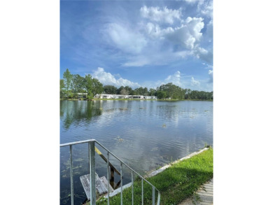 RETIRE WITH CONFIDENCE. HOA is LOW and includes on Cypress Point RV Golf Club in Florida - for sale on GolfHomes.com, golf home, golf lot