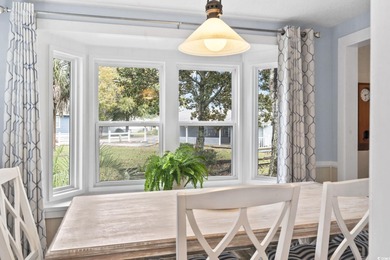 Welcome Home to Your Coastal Paradise! Get ready to kick back on Tupelo Bay Golf Complex  in South Carolina - for sale on GolfHomes.com, golf home, golf lot