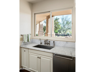 Impeccably maintained and perfectly positioned on the 6th on Desert Highlands Golf Club in Arizona - for sale on GolfHomes.com, golf home, golf lot