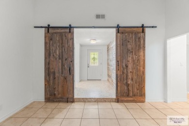 Spacious 3-bed, 3-bath home with two master suites--perfect for on Harlingen Country Club in Texas - for sale on GolfHomes.com, golf home, golf lot