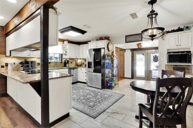 Stunning Log Cabin with breathtaking panoramic views of Lake on Nocona Hills Golf Course in Texas - for sale on GolfHomes.com, golf home, golf lot