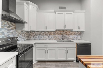 Spacious 3-bed, 3-bath home with two master suites--perfect for on Harlingen Country Club in Texas - for sale on GolfHomes.com, golf home, golf lot