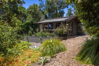 Located near the Lodge, this home offers breathtaking views of on Poppy Hills Golf Course in California - for sale on GolfHomes.com, golf home, golf lot