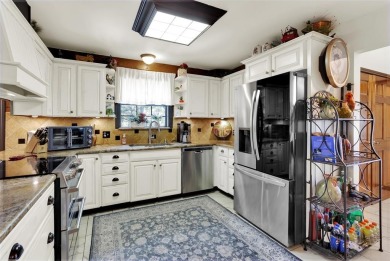 Stunning Log Cabin with breathtaking panoramic views of Lake on Nocona Hills Golf Course in Texas - for sale on GolfHomes.com, golf home, golf lot